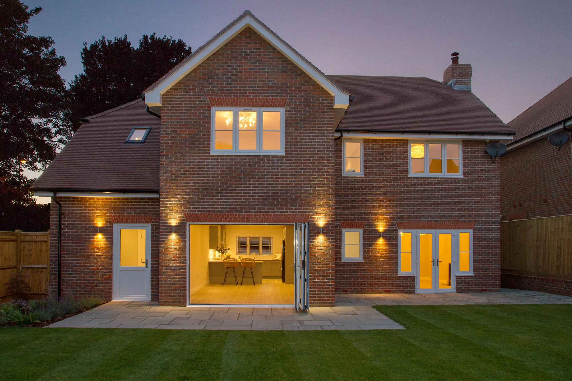 Boughtonwood Homes North Heath Lane property by night from rear